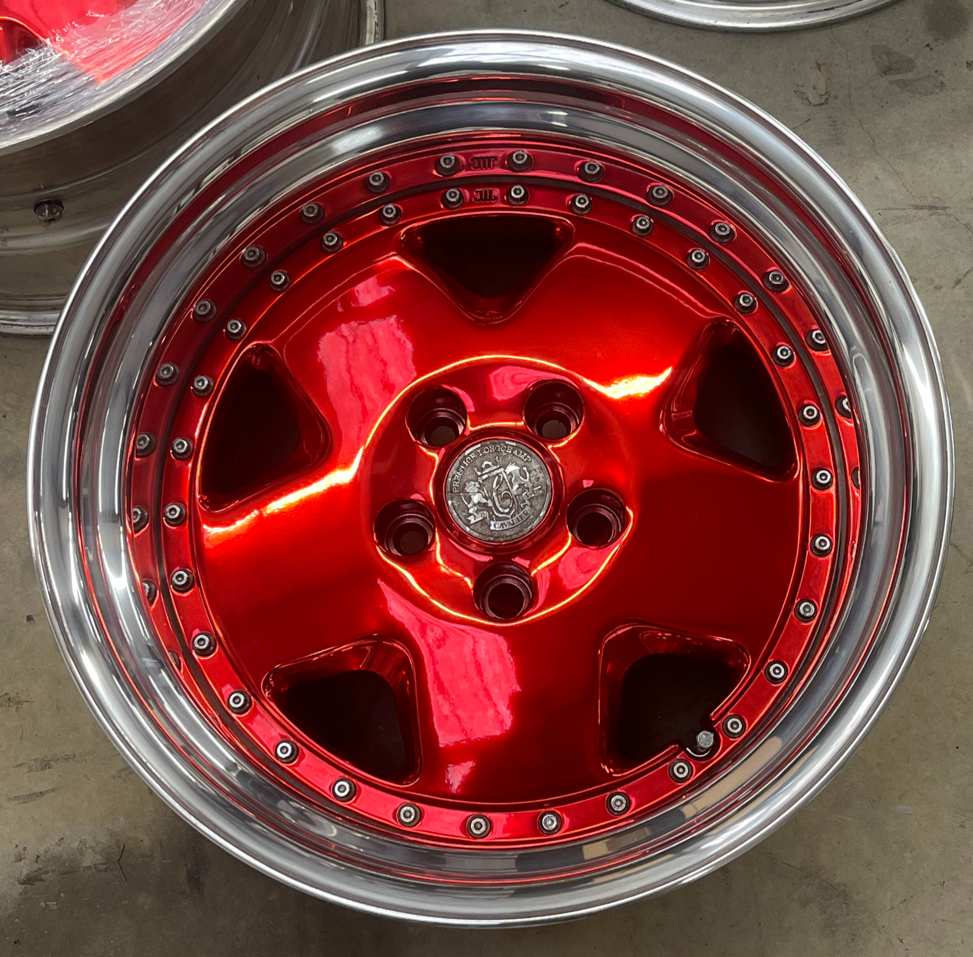 Candy red refinished wheel by Carolina Wheel Werkz
